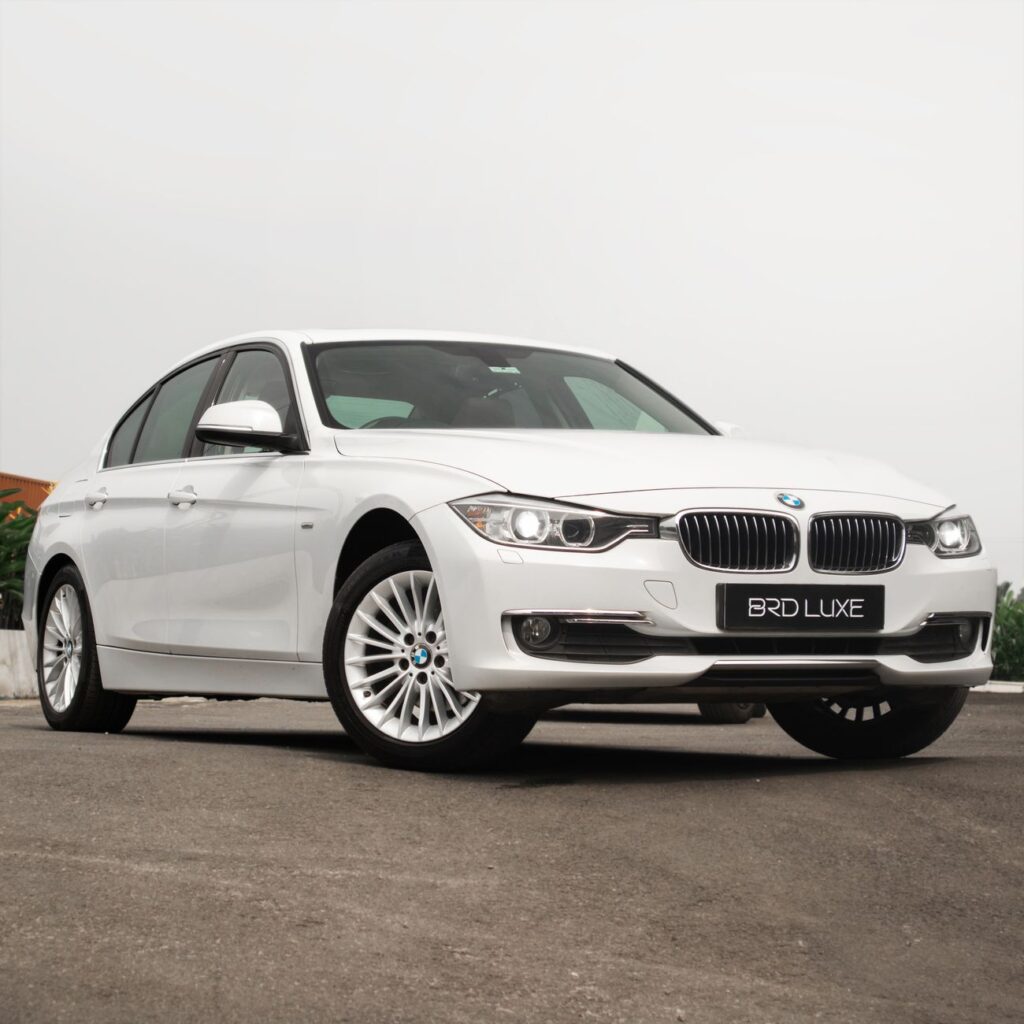 close up of a white luxury sedan